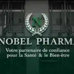 Nobel Pharma storefront sign with a green laurel wreath and French slogan about health and well-being