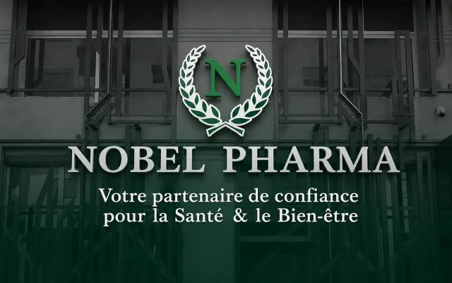 Nobel Pharma storefront sign with a green laurel wreath and French slogan about health and well-being